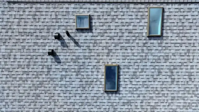Aerial view of a commercial building’s metal roofing system in Melbourne Beach, designed for hurricane resistance