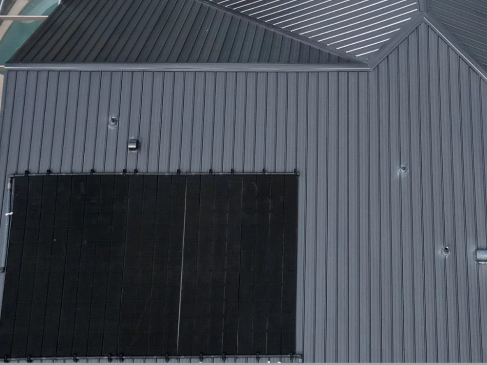 Commercial metal roof with solar panels on Florida building