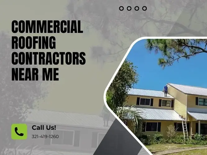 Commercial roof contractor working on metal roof with contact info displayed