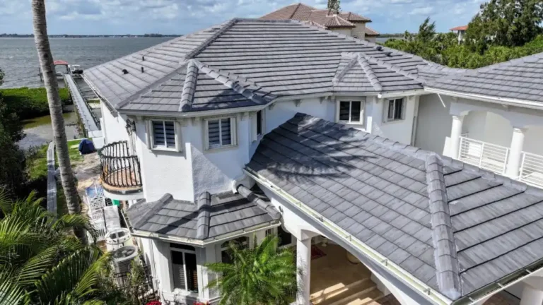 Gray tile roof on coastal Melbourne Beach house after professional replacement