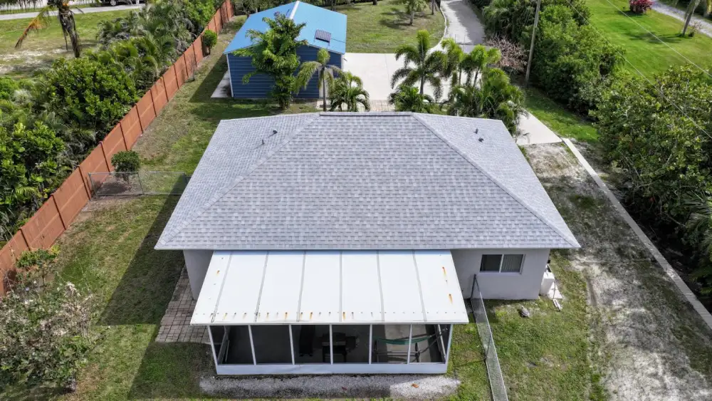 Melbourne home with residential roofing in a green, lush area, Florida
