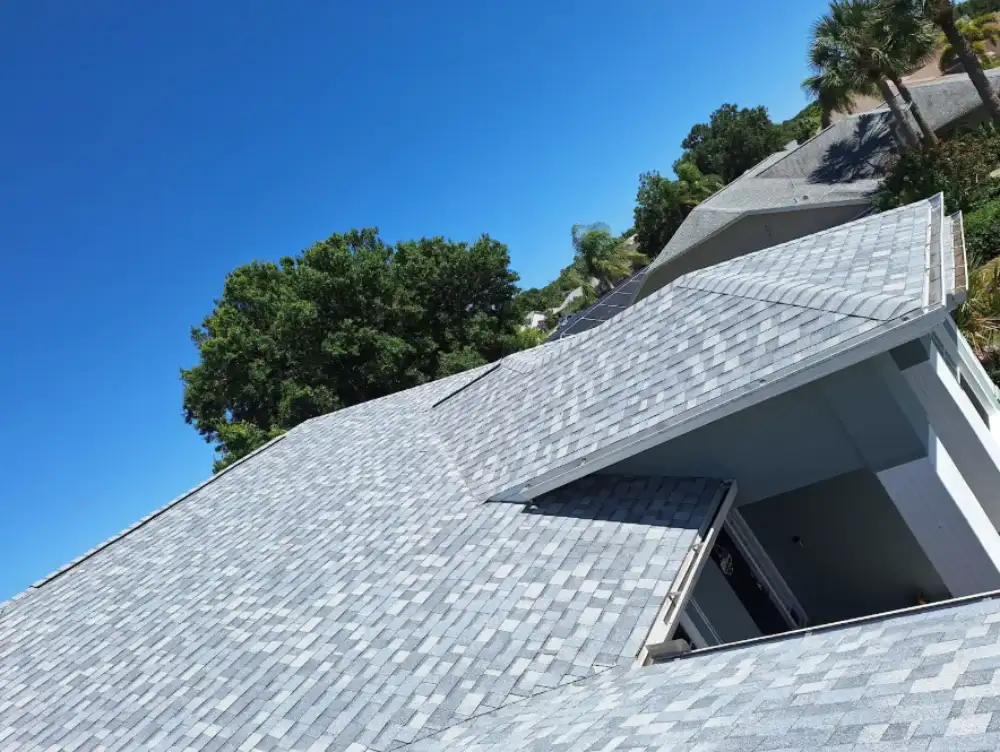 Overhead view of aging tile roof before roof repair services in Melbourne Beach